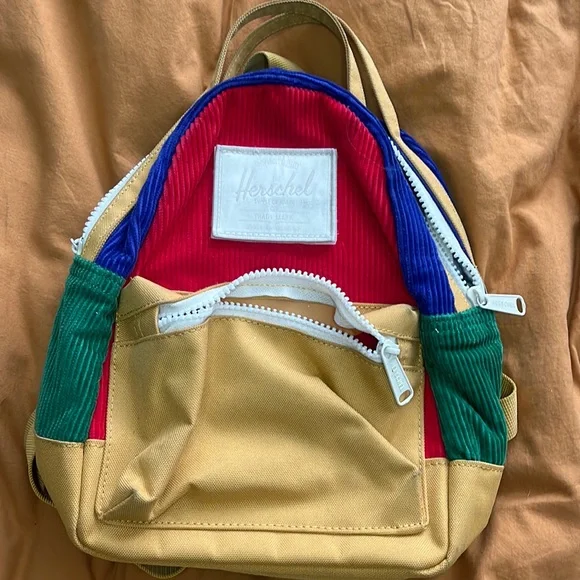 Herschel red, blue, yellow green corduroy mini backpack